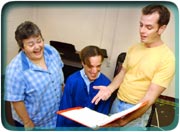 Flying high: Anne Cruzann (left) and Bobby 

MacCallum (center) rehearse <i>When Pigs Fly</i> 

with the festival’s artistic director Matthew 

Cloran.