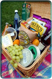 CHIPS ON YOUR SHOULDER: For ease of carrying, pack
up your snacks compactly, as with this hamper supplied
by Picnic.